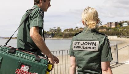 St John Event Health Services team walking along a promenade in Greens