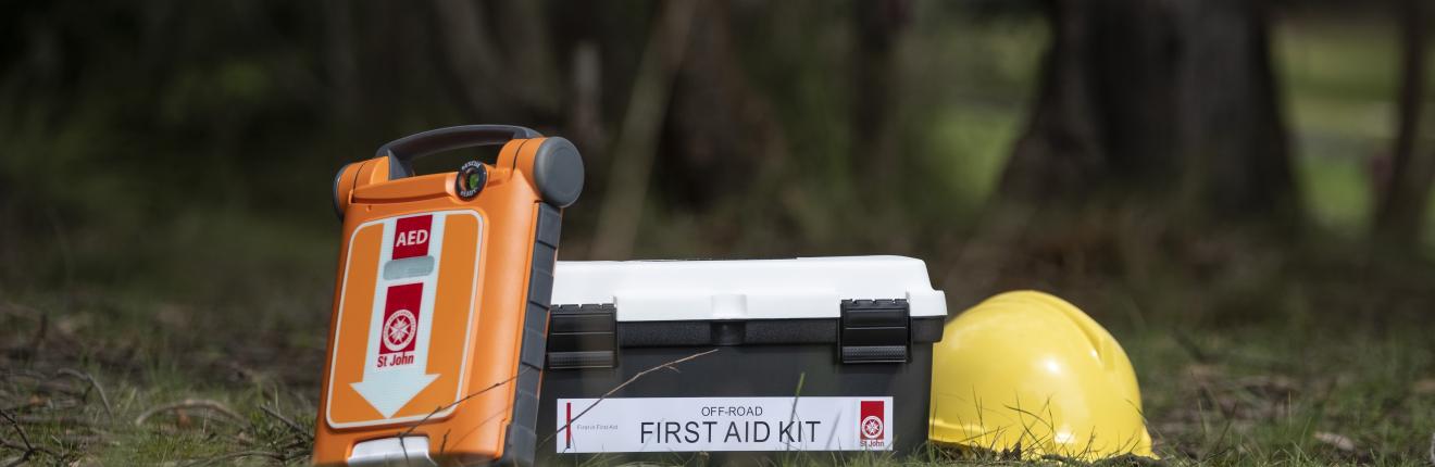 Defib, first aid kit and hard hat