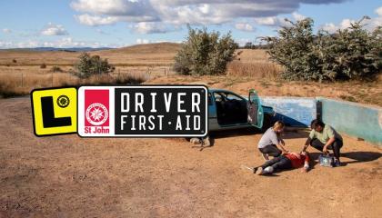 Driver first aid logo over image of a car accident