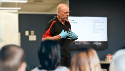 Trainer teaching First Aid