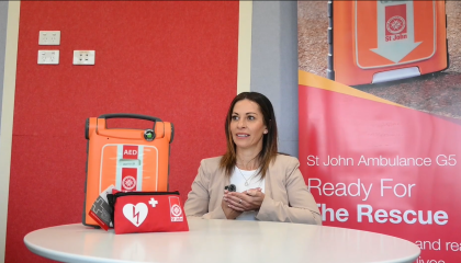 A woman being interviewed about first aid