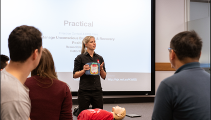 St John trainer demonstrating an AED