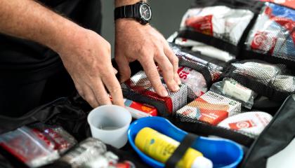 first aid kit open showing bandages