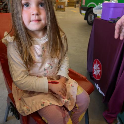 Little girl showing off her fake wound