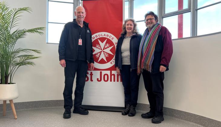 Rick, Wendy and Nicholas standing by at St John Ambulance banner
